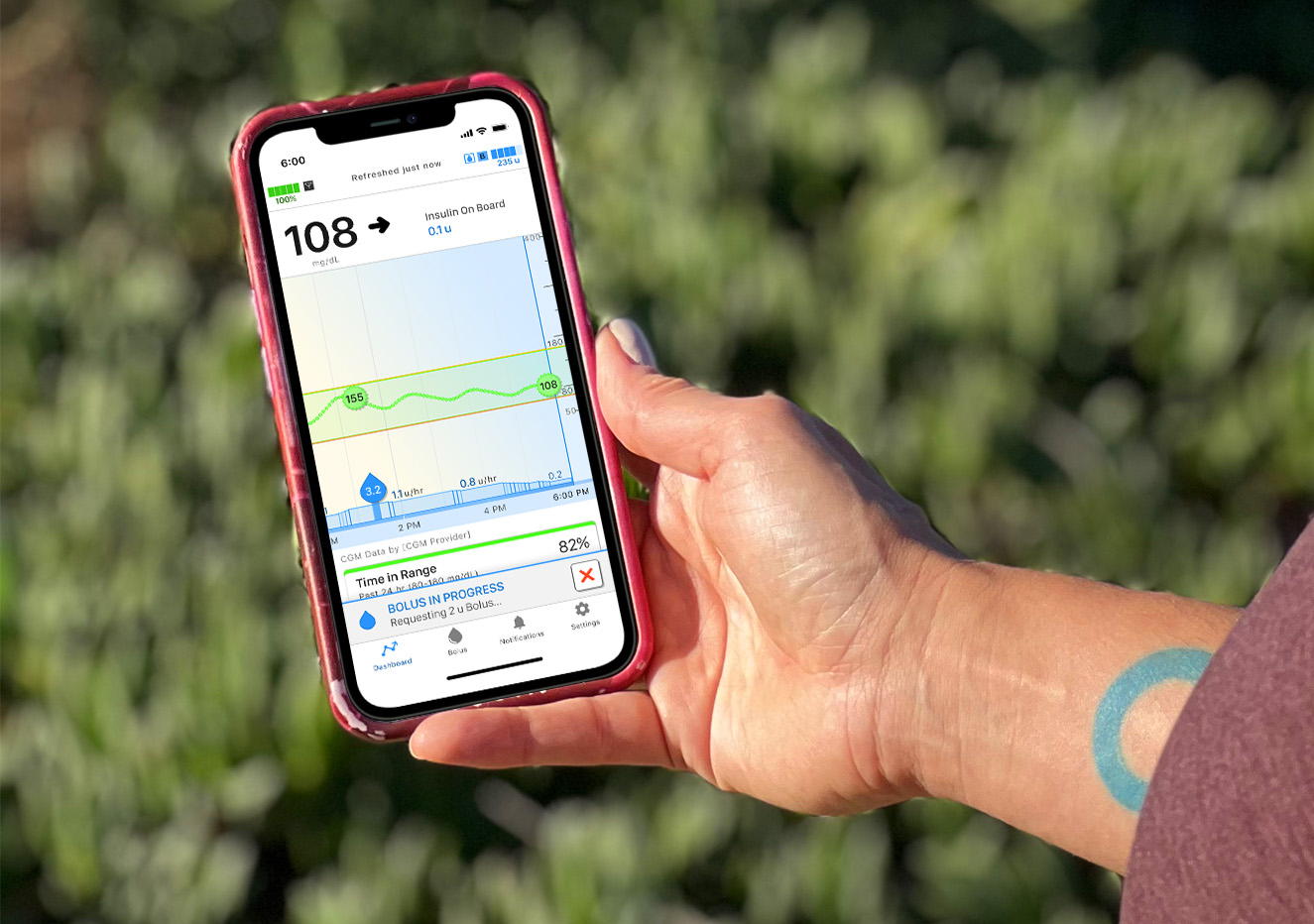 Laura using the t:connect app